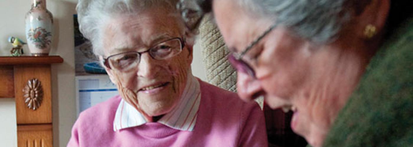 2 elderly women talking